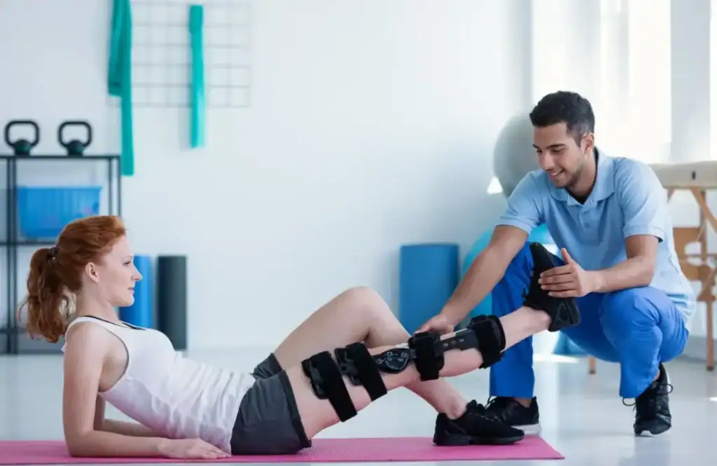 Woman having treatment to help muscle recovery Melton Mowbray after an injury